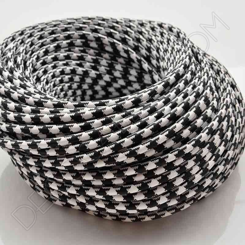 Cable eléctrico redondo vintage de tela de color blanco y negro jaspeado Cable eléctrico redondo vintage de tela de color blanco y negro jaspeado