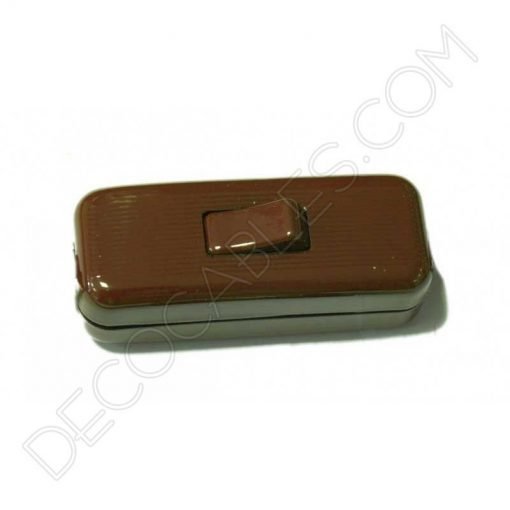 Interruptor de paso en color marrón